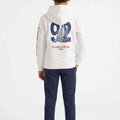 Boys white hoodie back view with large number patch and sailboat-style logo graphic