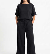 Black textured blouse and wide-leg pants set, short sleeves and drawstring waist
