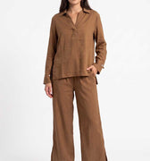 Women's brown co-ord set: long-sleeve button-up shirt and wide-leg pants, front view.