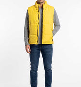 Men's yellow puffer vest with front zipper and stand collar