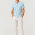 Men's baby blue embroidered polo shirt with crest logo at chest