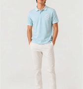 Men's baby blue embroidered polo shirt with crest logo at chest
