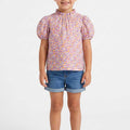 Purple printed baby girls blouse with puff sleeves and ruffled high neckline