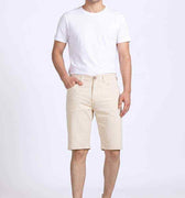 Men's chino shorts in light beige, front view, straight fit with belt loops