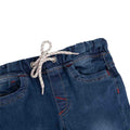Girls' mid-blue denim jeans with button fly, belt loops, and front pockets