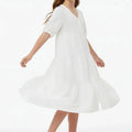 White tiered midi dress for girls with short sleeves and V-neck button front
