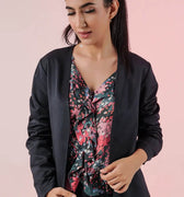 Womenâ€™s short dark blazer with long sleeves, open front and relaxed fit