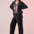 Womenâ€™s short dark blazer with long sleeves, open front and relaxed fit